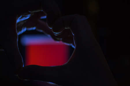 hands heart Valentines day image of the hands in the dark for the holiday