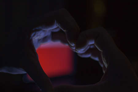 hands heart Valentines day image of the hands in the dark for the holidayの写真素材