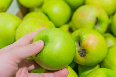 green apples on the market choosing the right food for juiceの写真素材