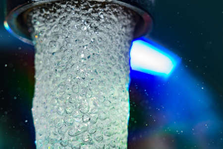 tap water closeup macro photo bubbles close upの写真素材