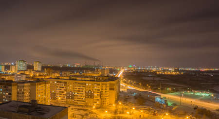 panorama of night city Russia Siberia Tyumen the roof of the houseの写真素材