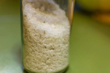 salt in the jar close-up sea salt through the glassの写真素材