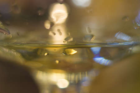 glass of white wine close-up macro photoの写真素材