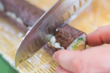 cooking sushi with cucumber and avocado vegetarian food