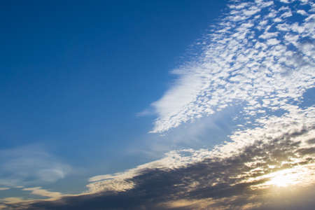 the texture of the clouds in the summer setting sun the clouds the sky
