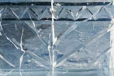 ice background abstraction winter background texture ice frozen fence in the city