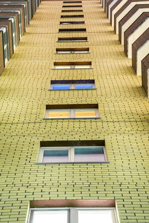 brick house view bottom window up view geometry abstraction architectureの写真素材