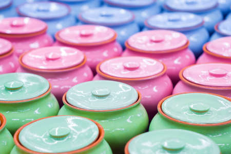 colored clay pots on the counter of the store abstraction background retro design, interiors design decoration designの写真素材