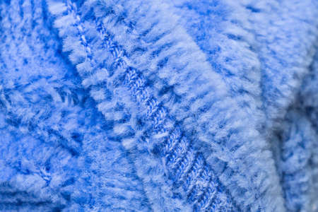 blue fluffy fabric close-up background texture microfiber textileの写真素材