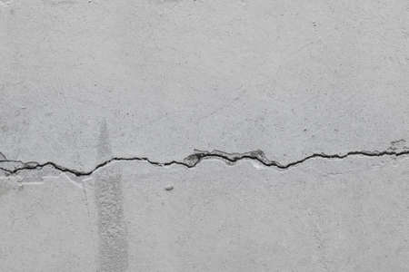 crack in an old concrete wallの写真素材