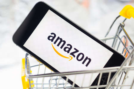 online shopping Amazon company logo online store on the phone screen close-upのeditorial素材