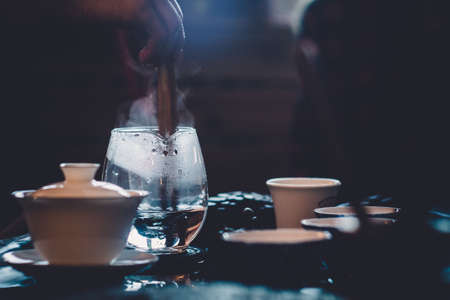 tea ceremony selective focus dark background rustic styleの写真素材
