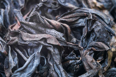 dried red black Chinese tea close - up macro photographyの写真素材