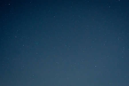 texture background of starry sky at night on dark blue