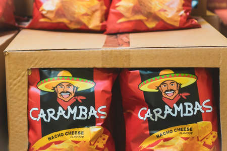 Volzhsky, Russia - apr 26, 2019: Products of hypermarket sale carambas chips in the metro store cash...