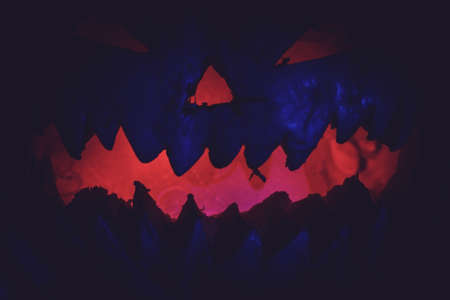 pumpkin on Halloween fear horror. autumn festival horror on a dark background