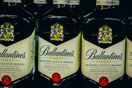 Tyumen, Russia - avg 25, 2019: Products of hypermarket sale Ballantine beverages in the metro store...