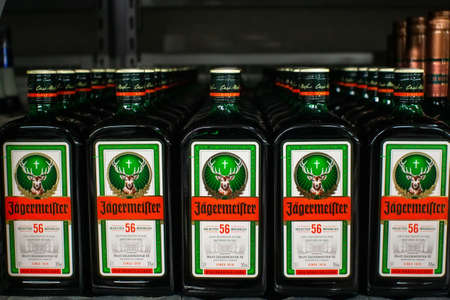 Tyumen, Russia-November 05, 2019: Bottle of Jagermeister, German digestif made with 56 herbs and spices, the flagship product of Mastのeditorial素材