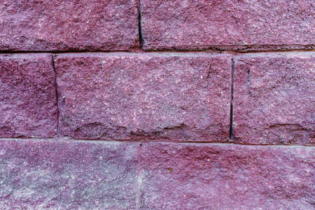 old pink brick wall close-up. texture background abstract retro style.の写真素材