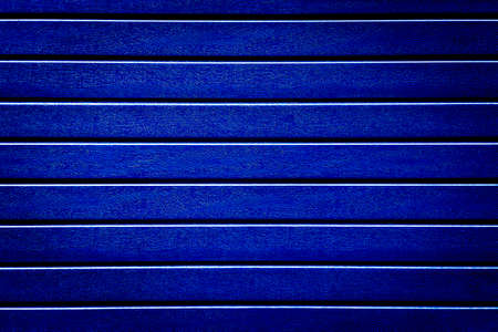 Dark blue tone artificial wood background wall texture abstractionの写真素材