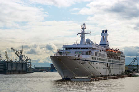 St. Petersburg, Russia, July 28: a Large white ship named astor, on the Neva river. Cloudy day....