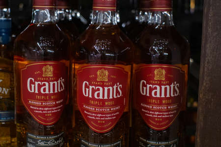 Tyumen, Russia - November 20, 2019: Bottle of Grant's whisky, the oldest family-owned blended whisky, bottled by William Grant Sons in Scotland. sale of alcoholic beverages on the shelves of the hypermarketのeditorial素材