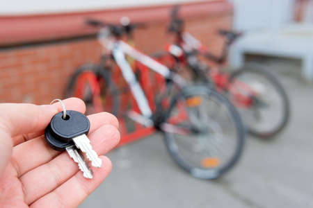 Bike locked securely via u-lock in bicycle parking area. Security, stolen bikeの写真素材