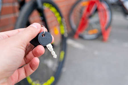Bike locked securely via u-lock in bicycle parking area. Security, stolen bikeの写真素材