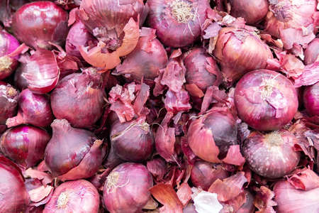 red onion close-up. Agricultural, selling vegetables on the marketの写真素材