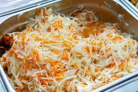 Homemade Sauerkraut with Carrot and Salad Cabbage. Fermented food.の写真素材
