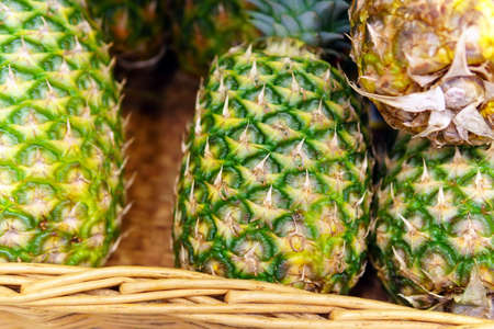 Pineapple fruit in market Close up. Bio Food On A Health Food Store Counterの写真素材