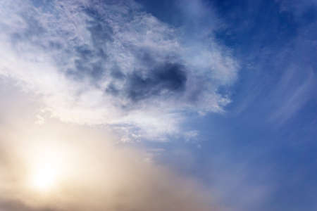 Clear blue sky and white clouds summer backgroundの写真素材