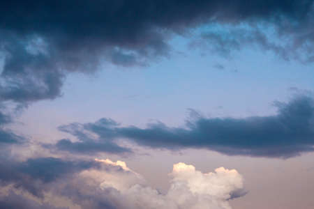 clouds in the sky background dramatic light, before the rain. Space for textの写真素材
