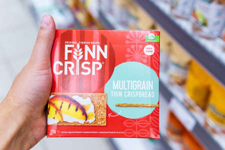 Tyumen, Russia-August 01, 2020: Finn Crisp thin sourdough rye bread made by Vaasan Oy. Vaasan Oy is the largest thin crisp producer in the world.のeditorial素材