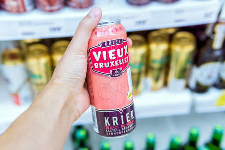 Tyumen, Russia-August 01, 2020: vieux beer in the hands of the buyerのeditorial素材