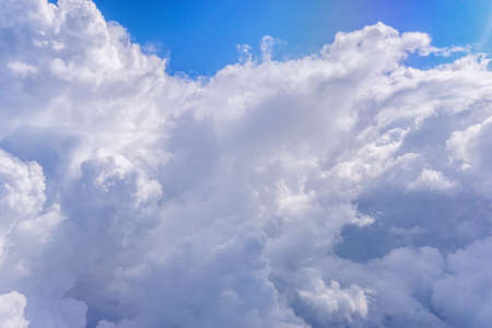 Clouds and sky as seen through the plane window. background, space for copy spaceの写真素材