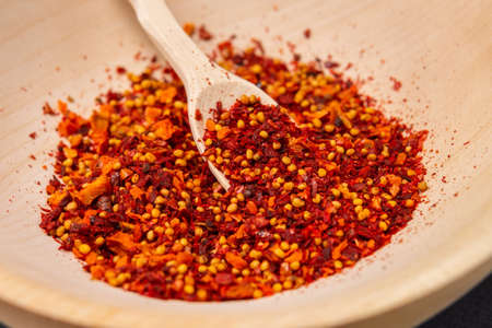 Spices and herbs in wooden bowls. Food and kitchen ingredients. selective focus