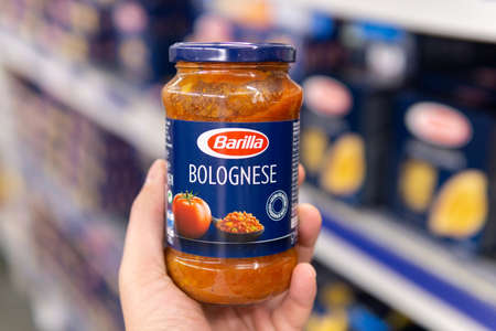 Tyumen, Russia-October 11, 2020: Barilla sauces on a supermarket shelf. The Barilla group produces several kinds of pastaのeditorial素材