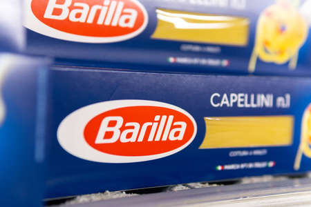 Tyumen, Russia-October 11, 2020: Barilla pasta on the shelves of the hypermarket. The company was founded in 1877, Italy by Pietro Barillaのeditorial素材