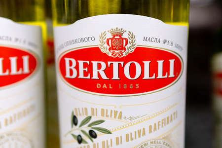 Tyumen, Russia-October 11, 2020: Bertolli logo olive oil in bottle sell in supermarket. Bertolli is an Italian food brand. close-up selective focusのeditorial素材