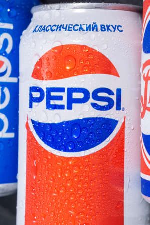 Tyumen, Russia-November 01, 2020: aluminum Can of Pepsi drink close-up PepsiCo logo with water...