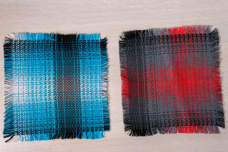 Kitchen napkins on a wooden table. Top view of the napkin. copy space.