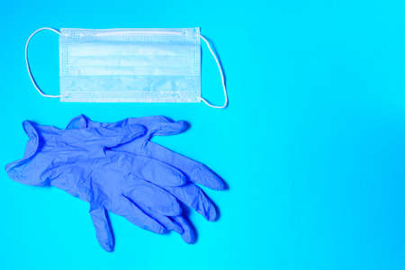 Medical mask, glasses protection against coronavirus. epidemic covid-19. top view, space for copying...