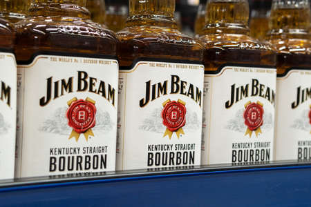 Tyumen, Russia-November 07, 2020: logo of the brand Jim Beam, selective focus. alcohol sales on hypermarket shelvesのeditorial素材