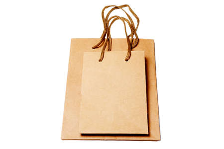 shopping package. paper kraft bag isolated on white background. Delivery and sale concept.の写真素材