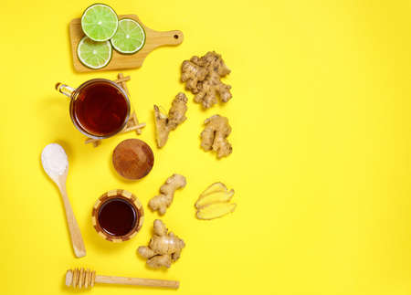 Ginger root and honey lime green. Dry ginger. yellow Background. view from the top. copy space