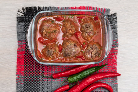 Baked meatballs on pan hot right out of the oven. food preparation. chili peppers