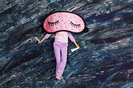 eye mask for sleeping, good night doll, for sleeping. Rest good night insomnia tired concept. with...