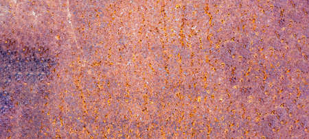 old red paint rust. Rusted painted metal wall. Old Rusty background with streaks of rust. Rust...