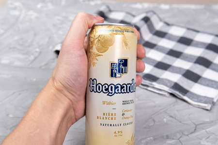Tyumen, Russia-February 26, 2021: Hoegaarden beer can, Hoegaarden Brewery is a brewery in Hoegaarden, Belgiumのeditorial素材